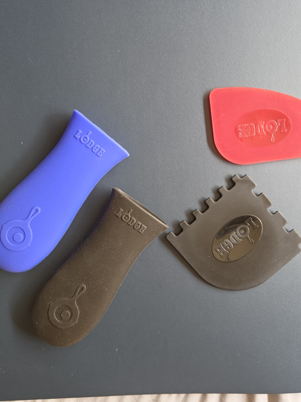 Lodge Silicone Handle Sleeve and Scraper Set - Blue, Red, Brown